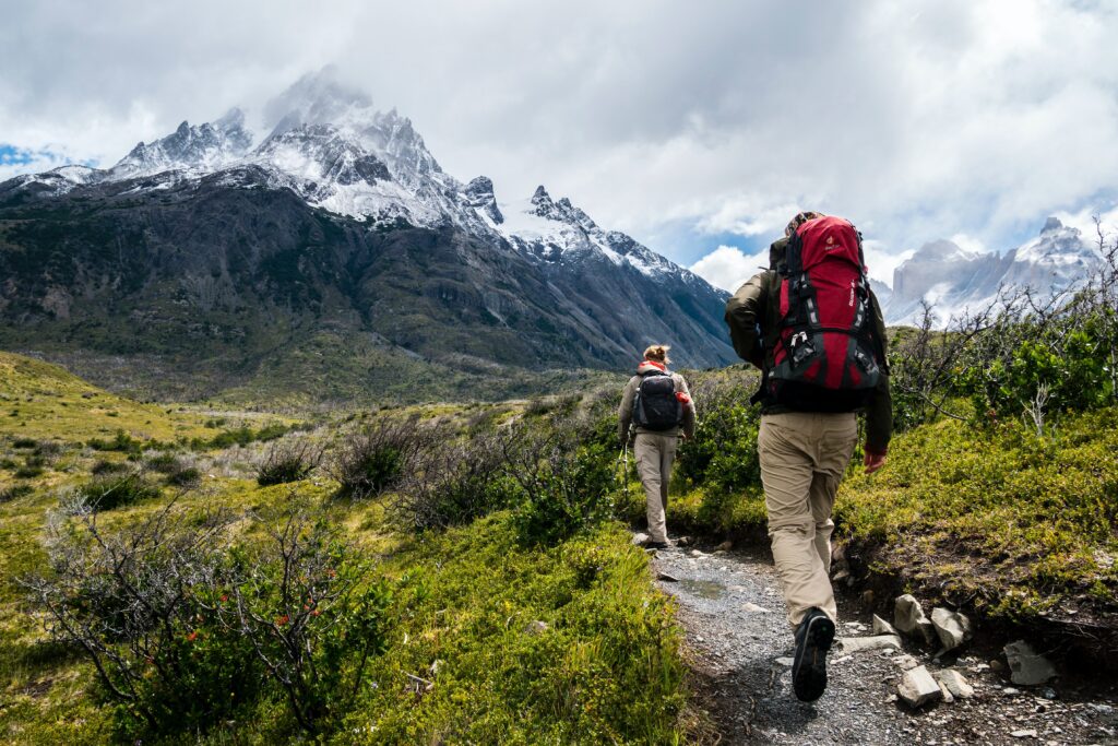 people hiking in the mountain